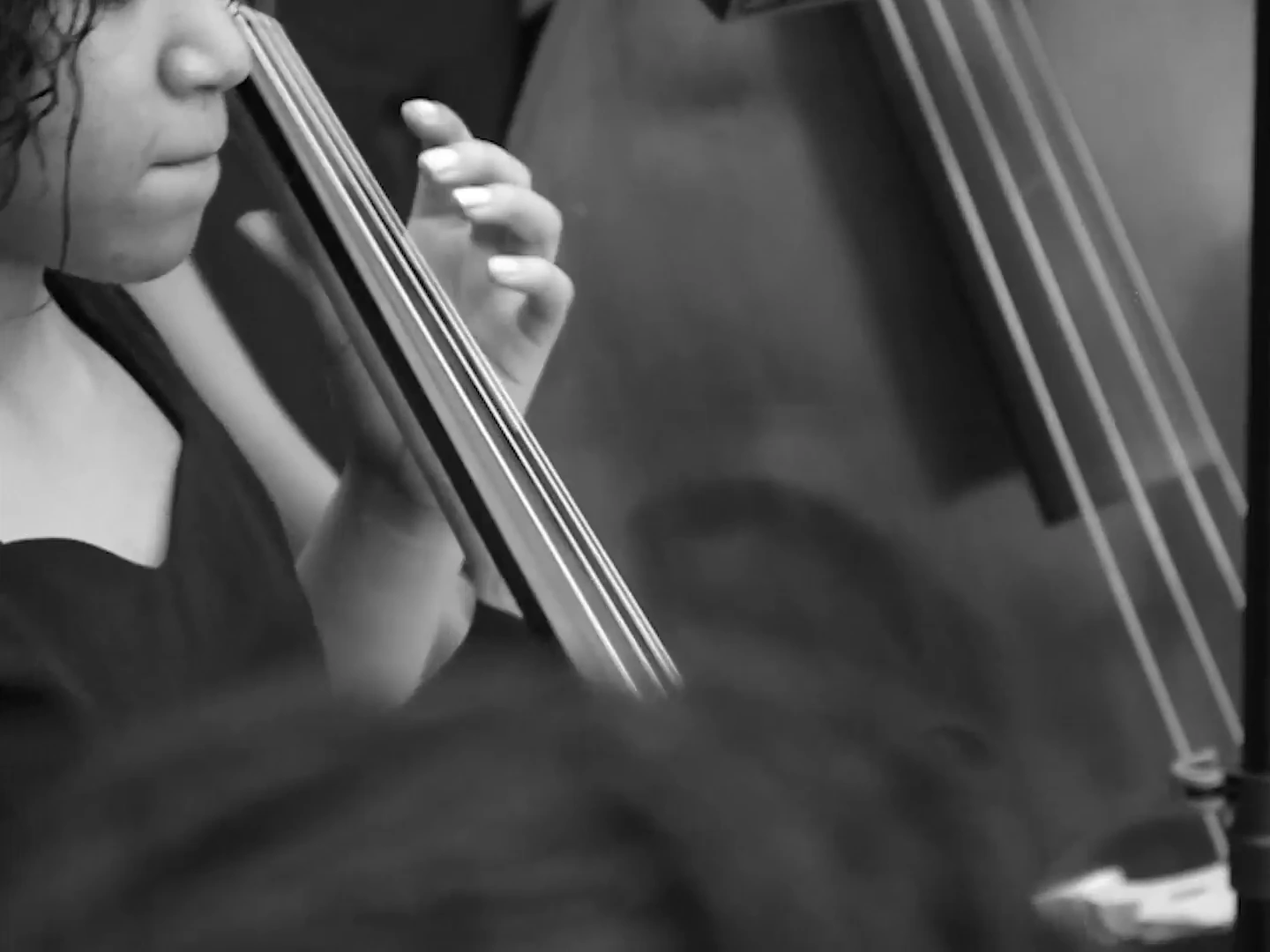 An authentic monochrome close-up of a cello student from the Noel Pointer Foundation anniversary film.